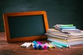 Back to school concept - School stationary with blackboard Royalty Free Stock Photo
