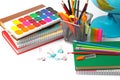 Back to school concept. School supplies on the table, white background. Pencils, pens, rulers, globe, books and notebooks Royalty Free Stock Photo