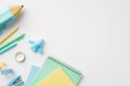 Back to school concept. Top view photo of school supplies blue pencil-case plane shaped sharpener copybooks adhesive tape mini Royalty Free Stock Photo