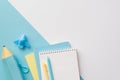 Back to school concept. Top view photo of yellow and blue school accessories notepads plane shaped sharpener pens and blue pencil- Royalty Free Stock Photo