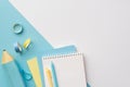 Back to school concept. Top view photo of yellow and blue school supplies notepads adhesive tape pens and blue pencil-case on Royalty Free Stock Photo