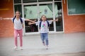 Back to school. Cute Asian child girl with a backpack running and going to school with fun Royalty Free Stock Photo