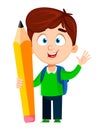 Back to school. Cute boy holding big pencil Royalty Free Stock Photo