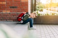 Back to school. Cute child with backpack, holding notepad and training books. School boy pupil with bag. Elementary Royalty Free Stock Photo