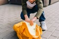 Back to school. Cute child packing backpack, holding notepad and training books going to school. Boy pupil with bag Royalty Free Stock Photo