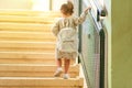 Back to school. Cute little child girl with backpack running and going to school with fun. Royalty Free Stock Photo