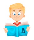 Back to school. Cute schoolboy reading book Royalty Free Stock Photo