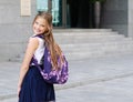 Back to school. Education concept. Cute smiling schoolgirl on the way to the schoo Royalty Free Stock Photo