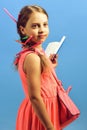 Back to school and education concept. Girl with serious face Royalty Free Stock Photo