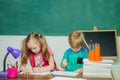 Back to school - education concept. School kids. Teachers day. Funny little child having fun on blackboard background Royalty Free Stock Photo