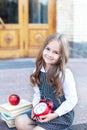 Back to school. Education and school concept. Preschool education. Girl with alarm clock. Child little girl hold red clock. It is