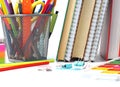 Back to school and education concept. School stationery and textbooks on the student desk, white background Royalty Free Stock Photo