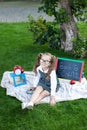 Back to school! Education, school concept. Education in kindergarten, preschoolers. A schoolgirl in glasses with lunch, books and