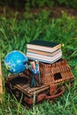 Back to school - school equipment and books on the basket. Soft focus Royalty Free Stock Photo