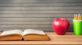 Back to School Essentials: Apple, Pencils, and Books. Royalty Free Stock Photo