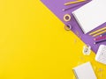 Back to school frame flat lay. Student supplies over office desk colorful background. Copy space Royalty Free Stock Photo