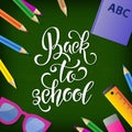 Back to school hand drawn lettering. Blackboard background with colorful pencils. Knowledge Day.