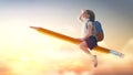 Child flying on a pencil Royalty Free Stock Photo