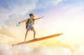 Child flying on a pencil Royalty Free Stock Photo