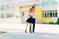 Happy kids are ready for elementary school, Happy classmates Boy and girl greet each other after quarantine, in the backyard Royalty Free Stock Photo