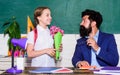 Back to school. Happy teachers day. teachers day. Daugghter and father with flowers. flower present for best teacher Royalty Free Stock Photo