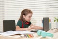 Back to school and home schooling. Happy school kid at lesson. Pupil in classroom at knowledge day. School time. Royalty Free Stock Photo
