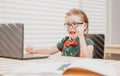 Back to school and home schooling. Happy school kid at lesson. Pupil in classroom at knowledge day. School time. Royalty Free Stock Photo