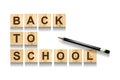 Back to school. An inscription from the alphabet on cubes. White background. Isolated.