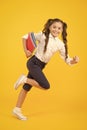 Back to school. Kid cheerful schoolgirl running. Pupil want study. Active child in motion. Beginning school lesson. Keep