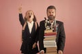 Back to school. Kid and dad hold pile of books and school supplies Royalty Free Stock Photo