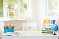 Back to school. Kids desk with books, globe Royalty Free Stock Photo