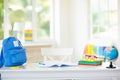 Back to school. Kids desk with books, globe Royalty Free Stock Photo