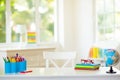 Back to school. Kids desk with books, globe Royalty Free Stock Photo