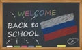 Back to school with learning and childhood concept. Banner with an inscription with the chalk welcome back to school and the Russi