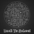 Back to school lettering in doodle circle on blue chalkboard background Royalty Free Stock Photo