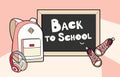 Back to school lettering vector illustration. Backpack, chalkboard, sneakers and headphones vector isolated set