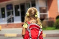 Back to school - little girl near preschool or daycare