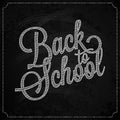 Back to school logo on chalk board design background Royalty Free Stock Photo