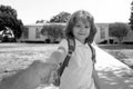 Back to school, lovely schoolboy holding parent fathers hand on the way to the school. Concept of primary school Royalty Free Stock Photo