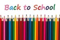 Back to School message with color pencils crayons on white Royalty Free Stock Photo