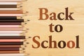 Back to school message with multiculture skin tone color pencils Royalty Free Stock Photo