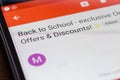 Back to School Offers and Discounts email message on smartphone screen closeup Royalty Free Stock Photo