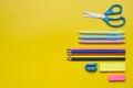 Back to school and office work concept. School supplies on yellow color background. Royalty Free Stock Photo