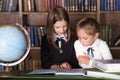 Back to school. Portrait of two girls, first graders.