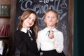 Back to school. Portrait of two girls, first graders.