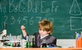 Back to school. Pupil looking through microscope . microscope at lab. small boy at science camp. student do science Royalty Free Stock Photo