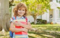 Back to school. Pupil of primary school on the way to study. First grader with school bag. Royalty Free Stock Photo