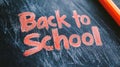 The back to school scene is illustrated with a stylish blackboard background displaying creative typography in a back to Royalty Free Stock Photo