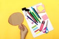 Back to school, school supplies and chat cardboard bubble on a yellow background. Protection of schoolchildren and students from t