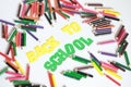 Back to school ,School supplies colored pencils in Fall scattered, isolated Royalty Free Stock Photo